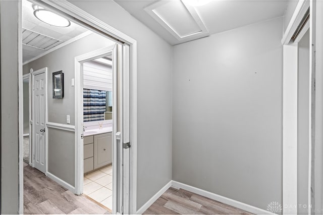 8684 Woodview Dr, Cincinnati, OH 45231 - corridor featuring light wood-type flooring and attic access
