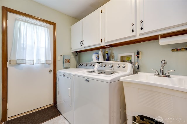 1396 Surrey Rd, Vandalia, OH 45377 - laundry room featuring cabinet space and washer and dryer