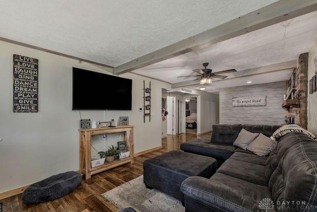 4510 Trenton Franklin Rd, Middletown, OH 45042 - living room with a textured ceiling, beam ceiling, ceiling fan, wood finished floors, and ornamental molding