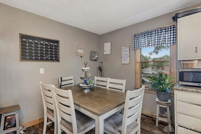4510 Trenton Franklin Rd, Middletown, OH 45042 - dining space featuring dark wood-type flooring and baseboards