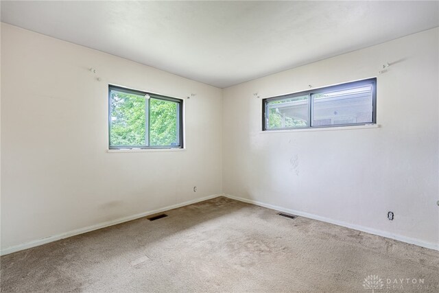 619 Storms Rd, Kettering, OH 45429 - carpeted spare room with healthy amount of natural light