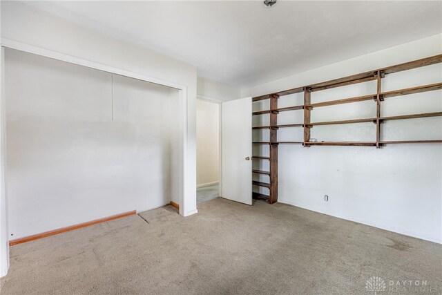 619 Storms Rd, Kettering, OH 45429 - unfurnished bedroom with carpet flooring and a closet