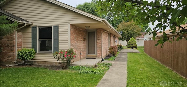 919 N Cherry St, Eaton, OH 45320 - view of property exterior featuring brick siding