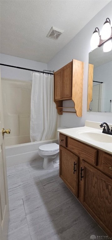 919 N Cherry St, Eaton, OH 45320 - full bathroom with vanity, shower / bath combination with curtain, and a textured ceiling