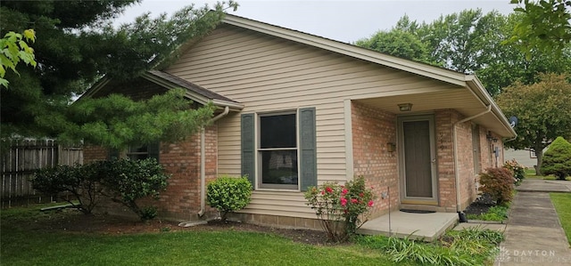 919 N Cherry St, Eaton, OH 45320 - view of side of property featuring brick siding