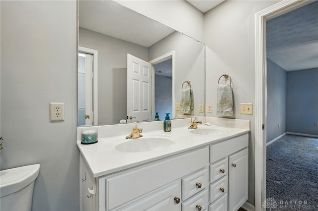 5015 Riverview Ave, Middletown, OH 45042 - bathroom with double vanity and toilet