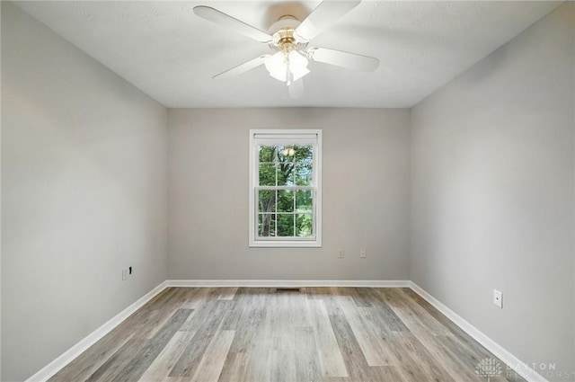 5015 Riverview Ave, Middletown, OH 45042 - empty room featuring light wood finished floors and ceiling fan