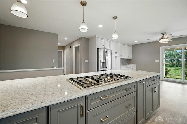 5015 Riverview Ave, Middletown, OH 45042 - kitchen featuring stainless steel appliances, gray cabinetry, ceiling fan, light wood-style flooring, and recessed lighting