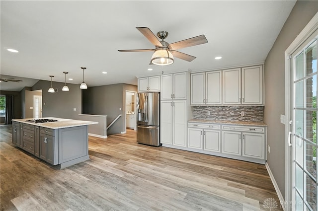 5015 Riverview Ave, Middletown, OH 45042 - kitchen with stainless steel fridge, ceiling fan, gray cabinetry, recessed lighting, and light wood-style flooring