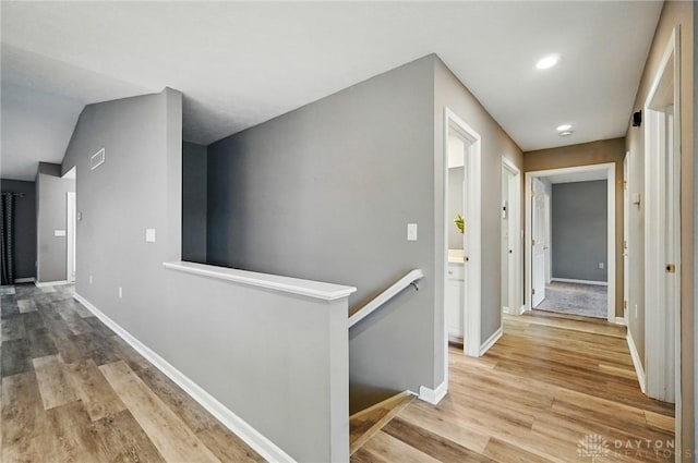 5015 Riverview Ave, Middletown, OH 45042 - hallway featuring an upstairs landing and wood finished floors