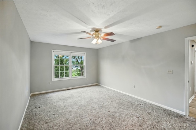 5015 Riverview Ave, Middletown, OH 45042 - unfurnished room featuring ceiling fan, carpet floors, and a textured ceiling