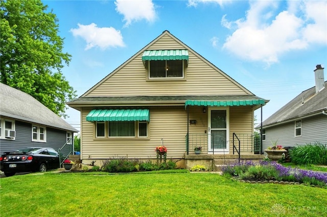 2540 Acorn Dr, Kettering, OH 45419 - bungalow-style house featuring a front yard