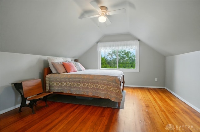 2540 Acorn Dr, Kettering, OH 45419 - bedroom featuring hardwood / wood-style floors, lofted ceiling, and a ceiling fan