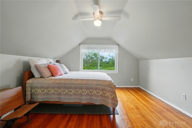 2540 Acorn Dr, Kettering, OH 45419 - bedroom with wood finished floors, ceiling fan, and vaulted ceiling