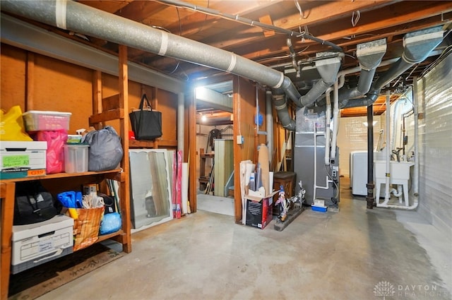 2540 Acorn Dr, Kettering, OH 45419 - unfinished basement with washer / clothes dryer and heating unit