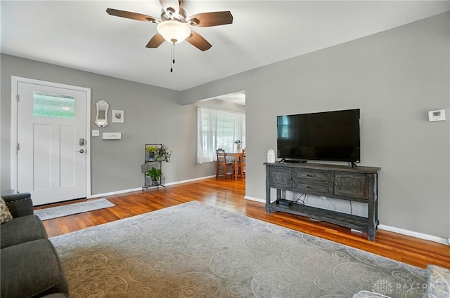 2540 Acorn Dr, Kettering, OH 45419 - living room featuring ceiling fan and wood finished floors