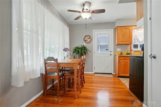 2540 Acorn Dr, Kettering, OH 45419 - dining area with light wood-style flooring and ceiling fan