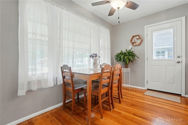 2540 Acorn Dr, Kettering, OH 45419 - dining room featuring light wood-style floors and a ceiling fan