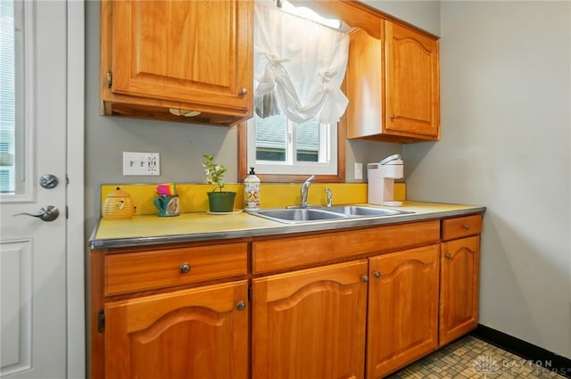 2540 Acorn Dr, Kettering, OH 45419 - kitchen featuring brown cabinetry and light countertops