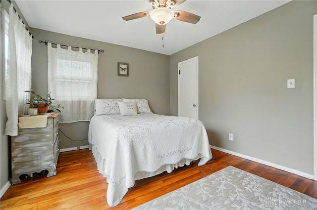 2540 Acorn Dr, Kettering, OH 45419 - bedroom with wood finished floors and a ceiling fan