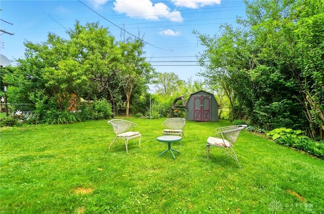 2540 Acorn Dr, Kettering, OH 45419 - view of grassy yard with a storage unit