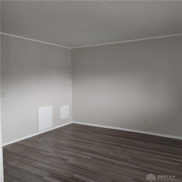1116 Eagle Feather Cir Unit B, West Carrollton, OH 45449 - empty room featuring crown molding and dark wood-style flooring