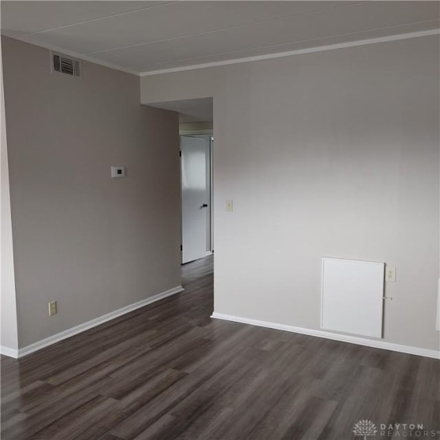 1116 Eagle Feather Cir Unit B, West Carrollton, OH 45449 - empty room featuring dark wood-style flooring and crown molding