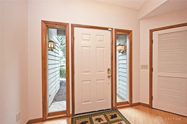 1241 Wind Field Ct, Washington Twp, OH 45458 - foyer entrance featuring baseboards and light wood finished floors