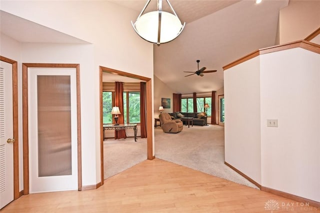 1241 Wind Field Ct, Washington Twp, OH 45458 - hall with light wood-style floors, high vaulted ceiling, and light colored carpet