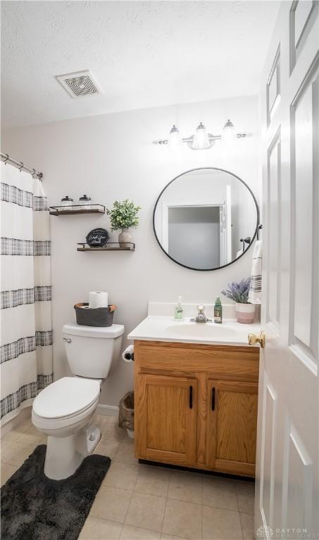 21 Meadowcrest Dr, Franklin, OH 45005 - bathroom featuring vanity and tile patterned floors