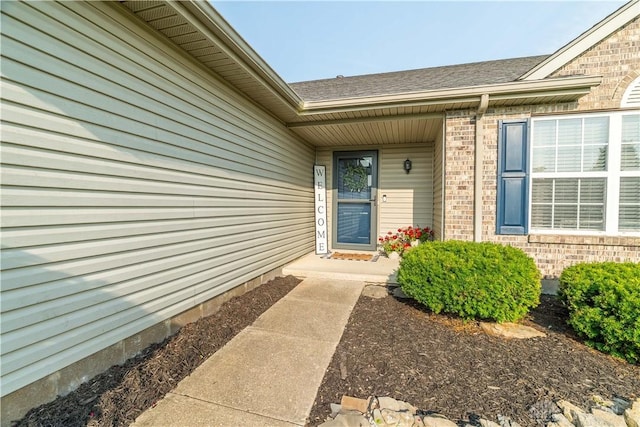 21 Meadowcrest Dr, Franklin, OH 45005 - doorway to property with brick siding and a shingled roof