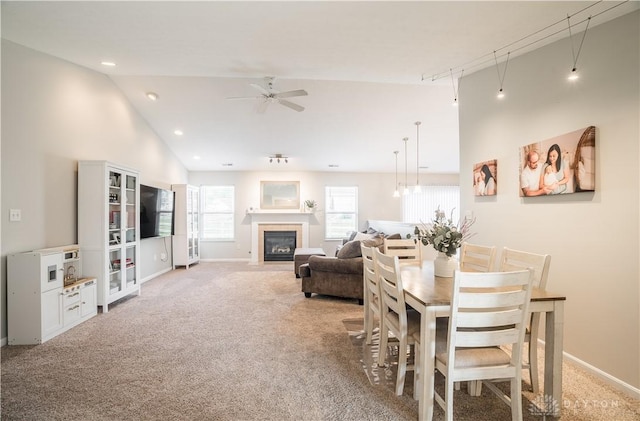 21 Meadowcrest Dr, Franklin, OH 45005 - carpeted dining area featuring a ceiling fan, recessed lighting, a fireplace with flush hearth, and lofted ceiling