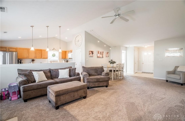 21 Meadowcrest Dr, Franklin, OH 45005 - living area with light colored carpet, vaulted ceiling, ceiling fan, and recessed lighting
