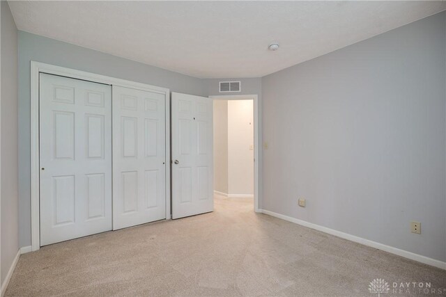 1360 Adamsmoor Dr, Waynesville, OH 45068 - unfurnished bedroom with carpet flooring and a closet