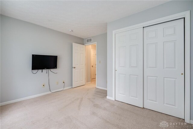 1360 Adamsmoor Dr, Waynesville, OH 45068 - unfurnished bedroom with carpet and a closet