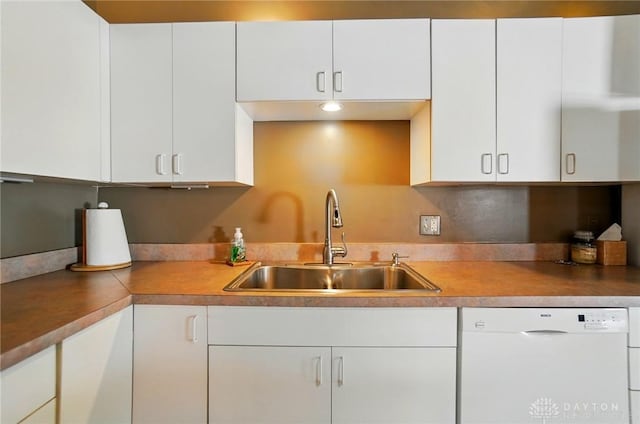 18 S Saint Clair St Unit 203, Dayton, OH 45402 - kitchen featuring white dishwasher, white cabinets, and light countertops