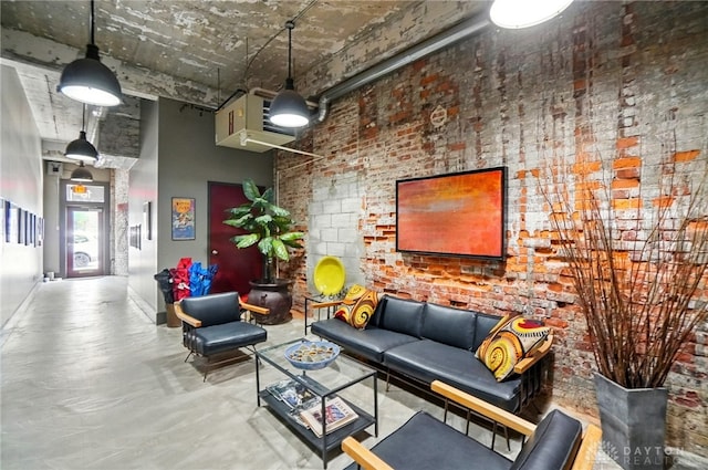 18 S Saint Clair St Unit 203, Dayton, OH 45402 - lobby with a towering ceiling and brick wall