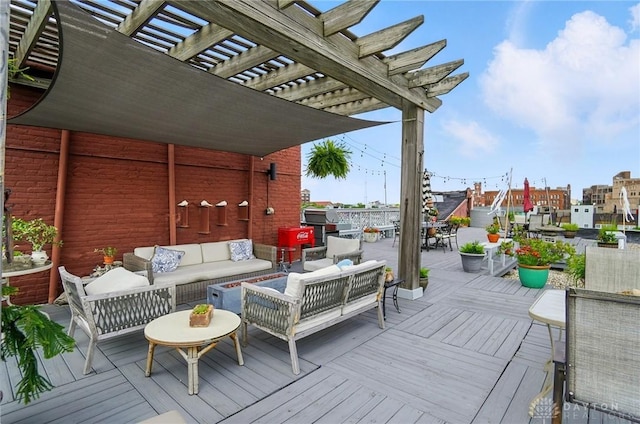 18 S Saint Clair St Unit 203, Dayton, OH 45402 - wooden terrace with a pergola and an outdoor living space