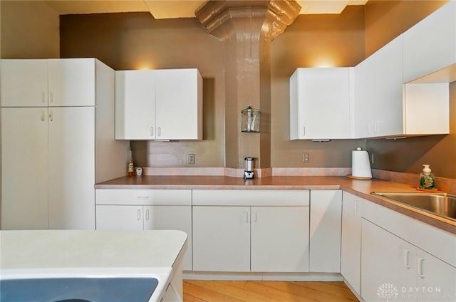 18 S Saint Clair St Unit 203, Dayton, OH 45402 - kitchen with white cabinets and light countertops