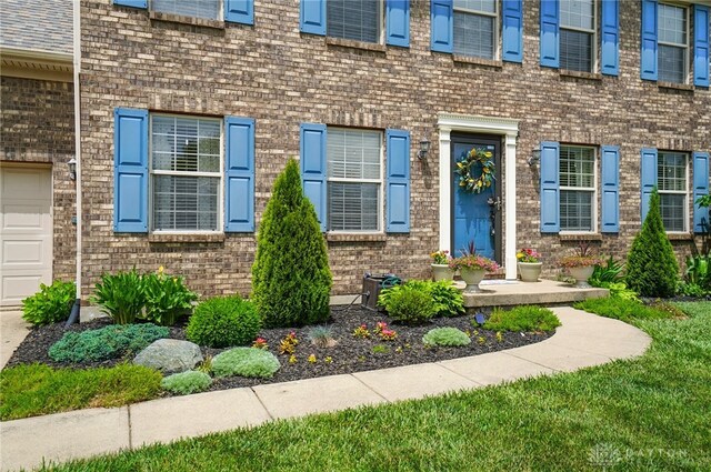 1510 Ash Ridge Ct, Vandalia, OH 45377 - entrance to property with brick siding and a garage