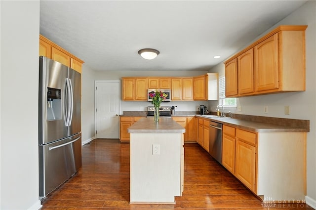1510 Ash Ridge Ct, Vandalia, OH 45377 - kitchen with stainless steel appliances, dark wood-type flooring, a center island, light brown cabinets, and recessed lighting
