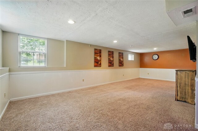 1510 Ash Ridge Ct, Vandalia, OH 45377 - below grade area featuring a textured ceiling, carpet floors, and recessed lighting