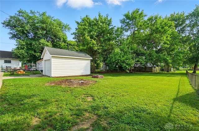 2003 Lowell St, Middletown, OH 45042 - view of yard featuring an outbuilding and a detached garage