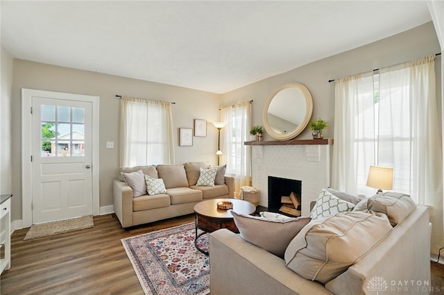 2003 Lowell St, Middletown, OH 45042 - living room with dark wood finished floors and a fireplace