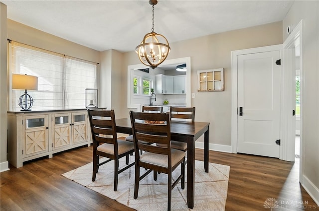 2003 Lowell St, Middletown, OH 45042 - dining space with a chandelier and dark wood-style floors