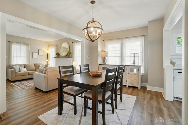 2003 Lowell St, Middletown, OH 45042 - dining space featuring a chandelier and dark wood-style floors