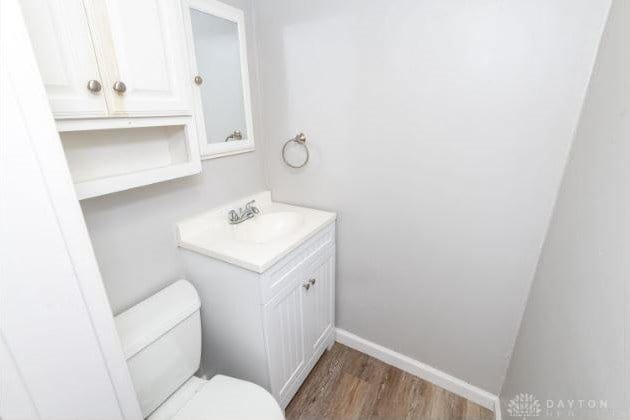 7293 Ellenridge Dr, Franklin, OH 45005 - bathroom with wood finished floors and vanity