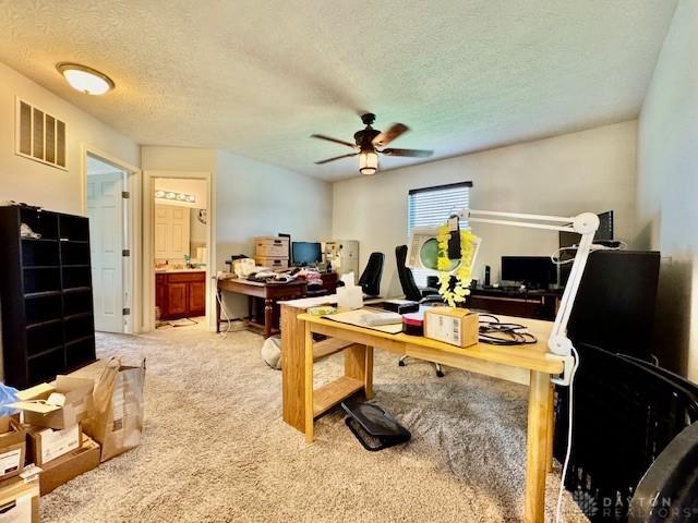 6460 Woodcreek Dr, Middletown, OH 45042 - office area with a ceiling fan, light colored carpet, and a textured ceiling