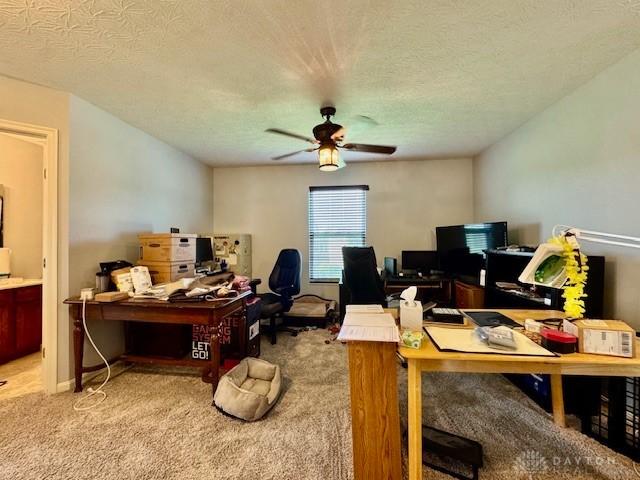 6460 Woodcreek Dr, Middletown, OH 45042 - carpeted office with a ceiling fan and a textured ceiling