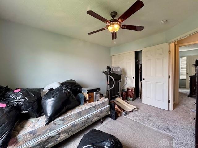 6460 Woodcreek Dr, Middletown, OH 45042 - carpeted bedroom featuring a closet and ceiling fan